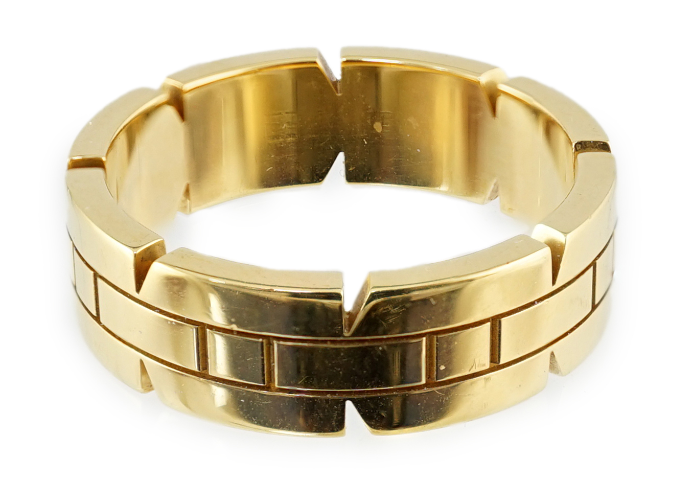 A modern 18ct gold Cartier Tank Francaise band